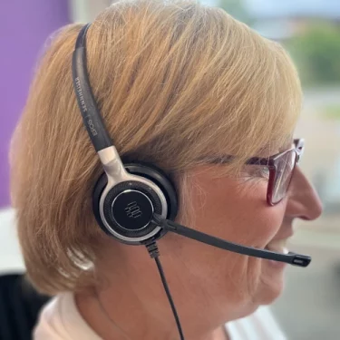 Care advisor talking on a headset