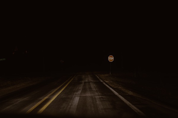 Dark road at night - an example of low night vision