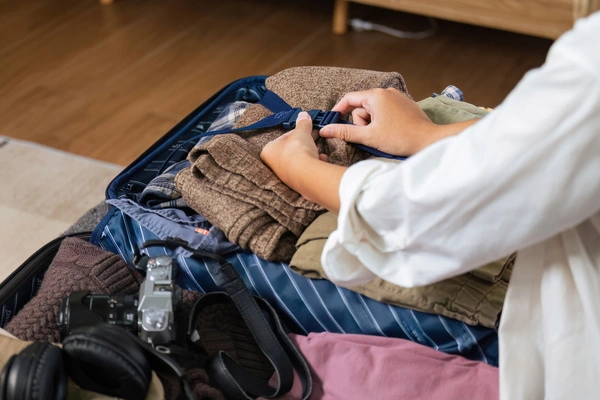 woman packing a bag