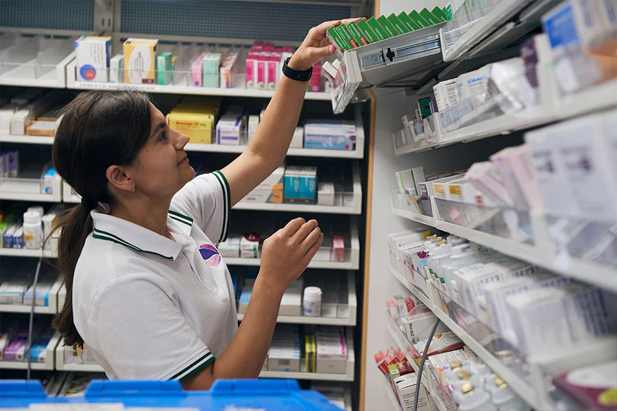 Pharmacist selecting some medication