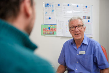 smiling consultant with patient