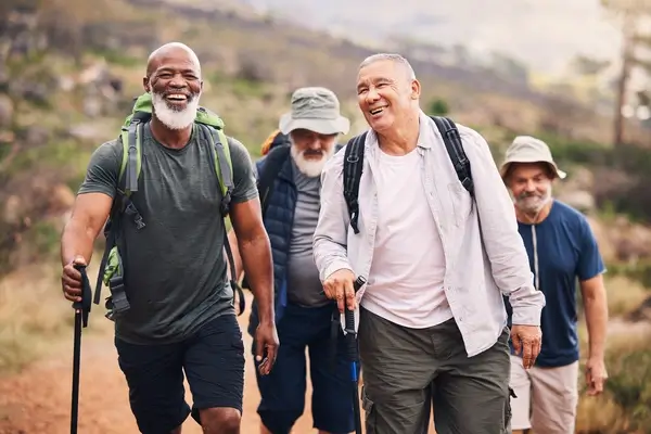 A group of older men on a hike