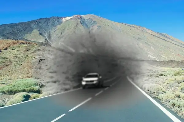 An image of a car on a road for someone with macular disease