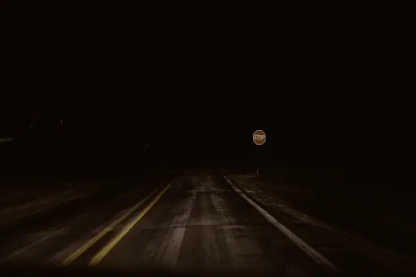 Image of dark road at night 