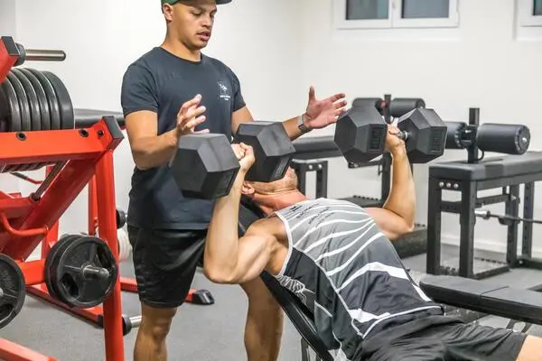 Member of the Olympics rowing team exercising in the gym