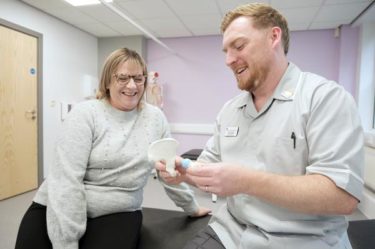 Birmingham hospital image of consultant and patient