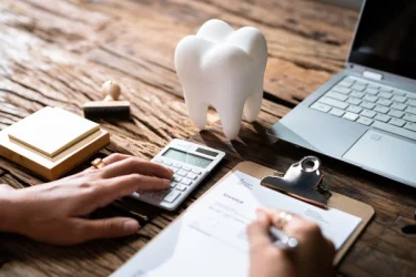 using dental insurance working at a desk