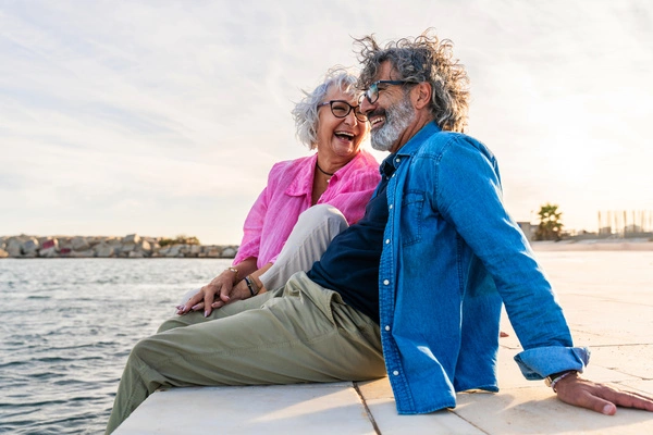 happy older people near the sea